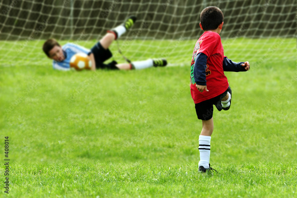 Obraz premium boys playing soccer