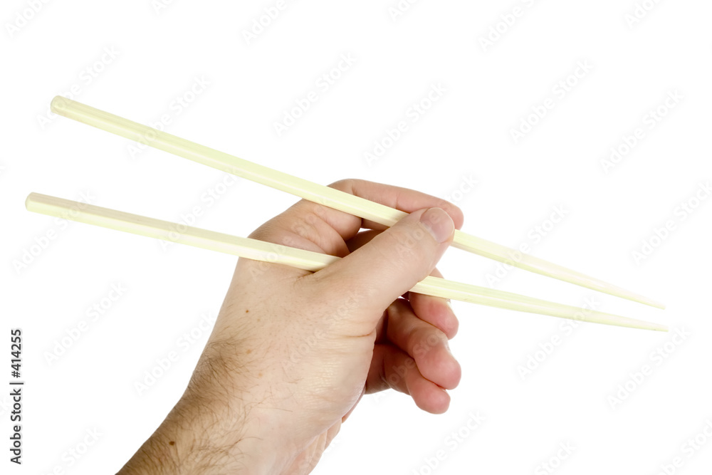 hand with chopsticks hand with chopsticks