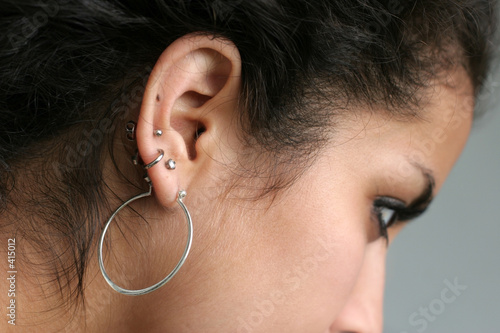 abstract of a girl with pierced ears