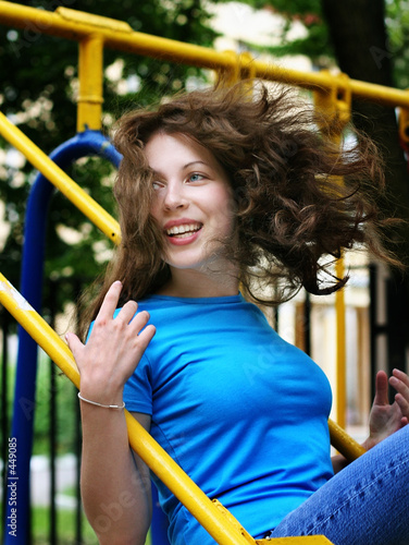 teenage girl on a swing