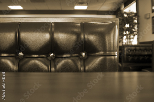 close up on a chrome restaurant booth