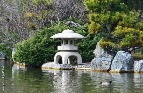 stone temple in japanese garden photo