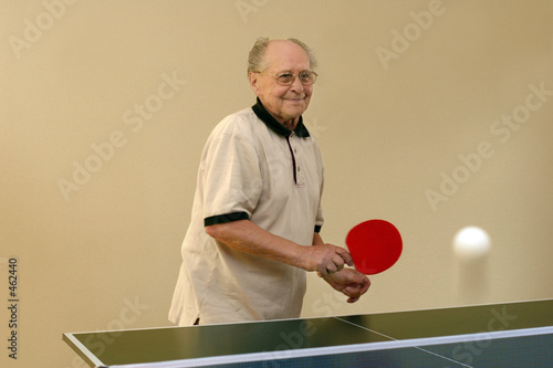 grandfather playing ping pong photo