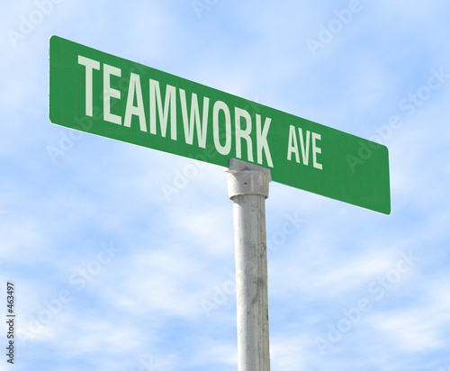 teamwork themed street sign