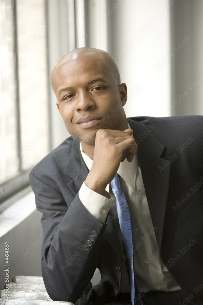 sitting by a window sitting by a window