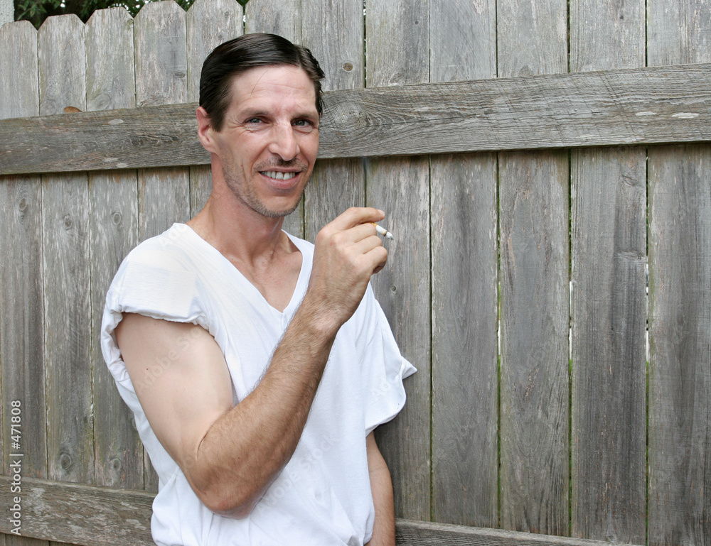 Foto attractive smoking man