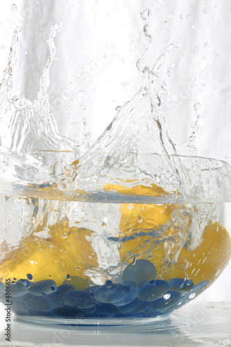 juicy citron splashing into water