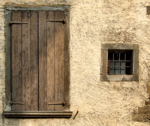 yellow rough wall and windows