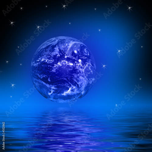 earth globe stars reflecting in water