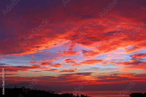 amazing deep red sky of sunrise in spain