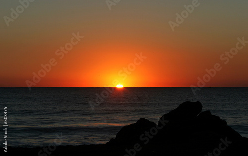 beautiful golden sunrise in southern spain as seen from the beac