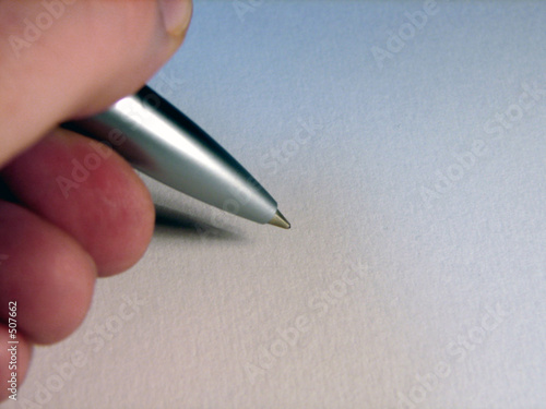 lefthanded man signing