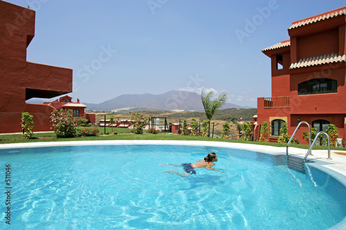 woman in spain  swimming in pool