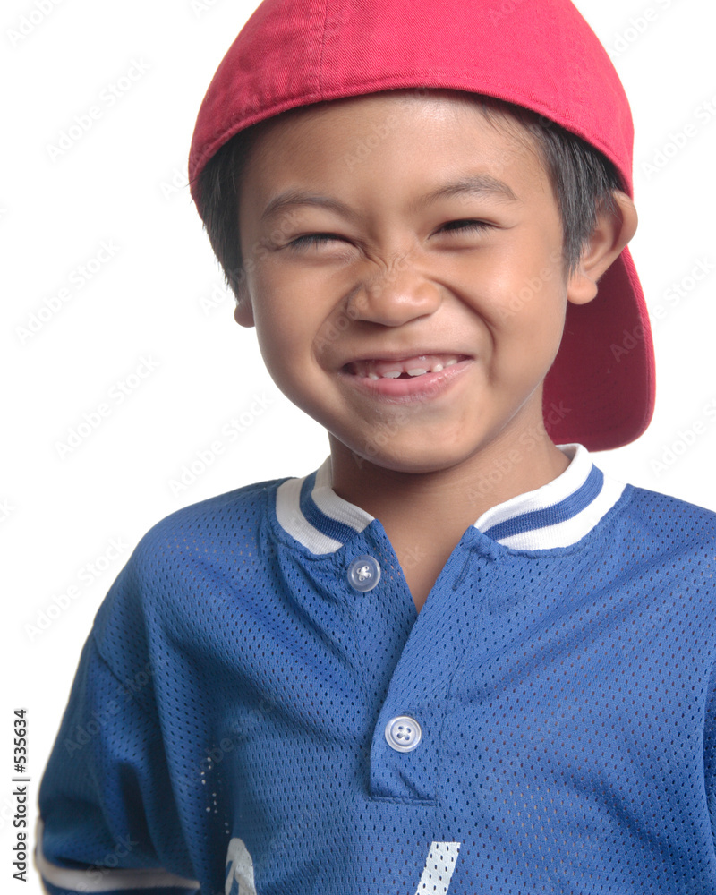 cute happy boy in red baseball cap cute happy boy in red baseball cap