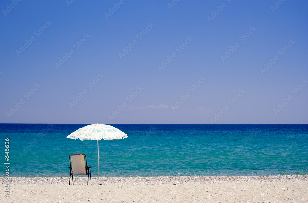 Fotografie umbrella and chair at beach