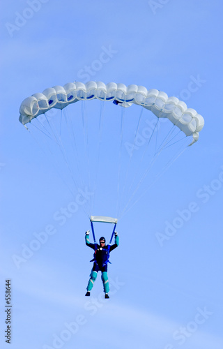 parachutist or skydiver coming in to land