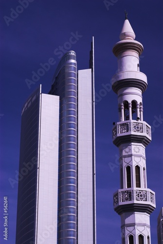 blue mosque and skyscraper