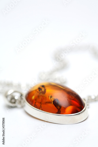 silver necklace with amber inlay