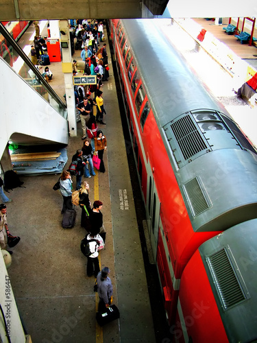 moving train at a railway station photo