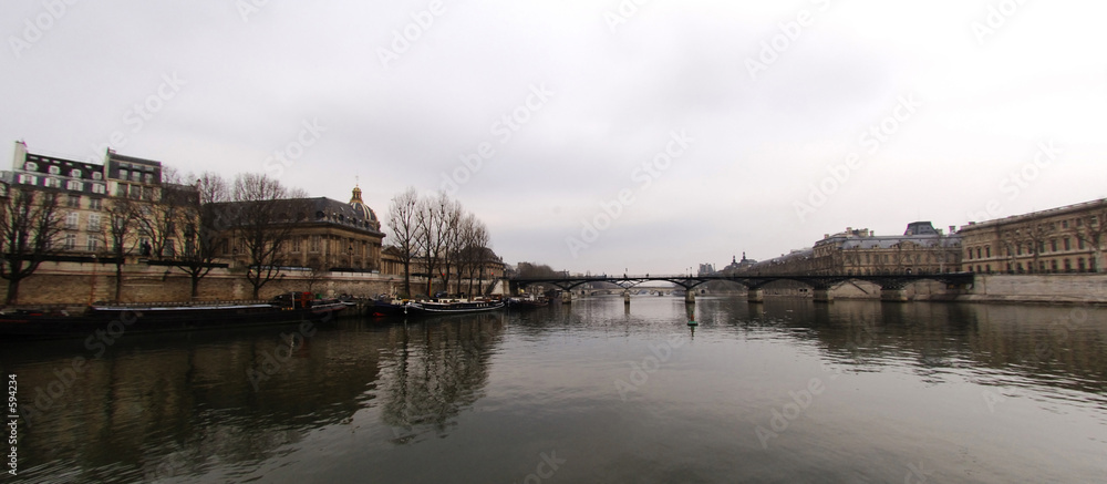 france, paris: seine river, pont des arts in winter