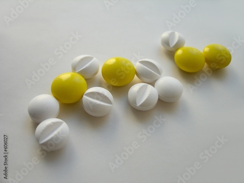 white and yellow tablets
