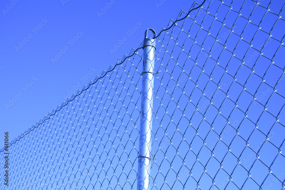 Φωτογραφία mesh fence with a post