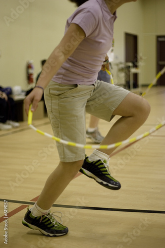 close-up of girl jumping rope