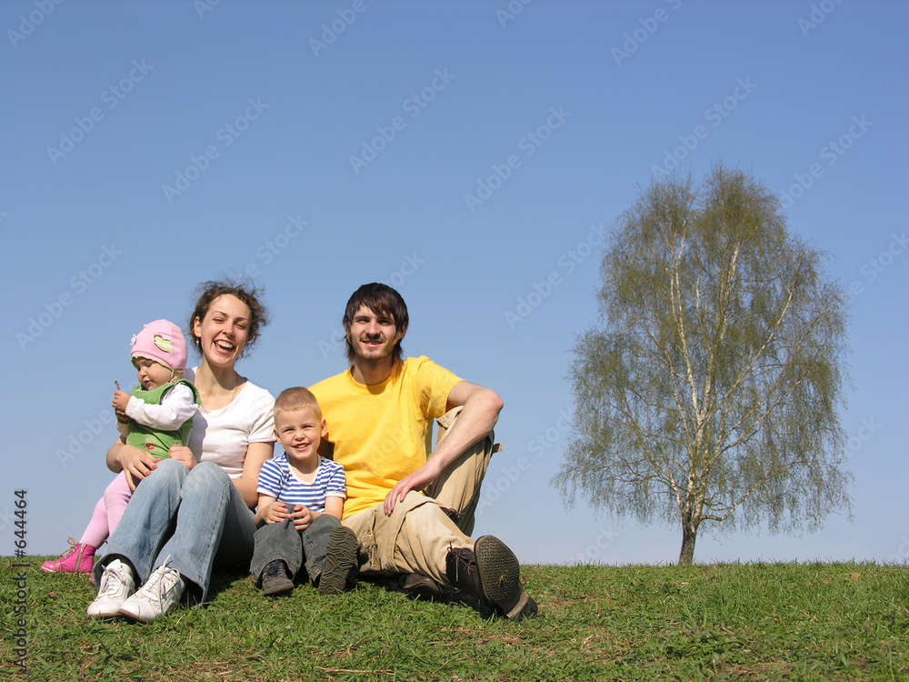 sitting family with two children. spring. sitting family with two children. spring.