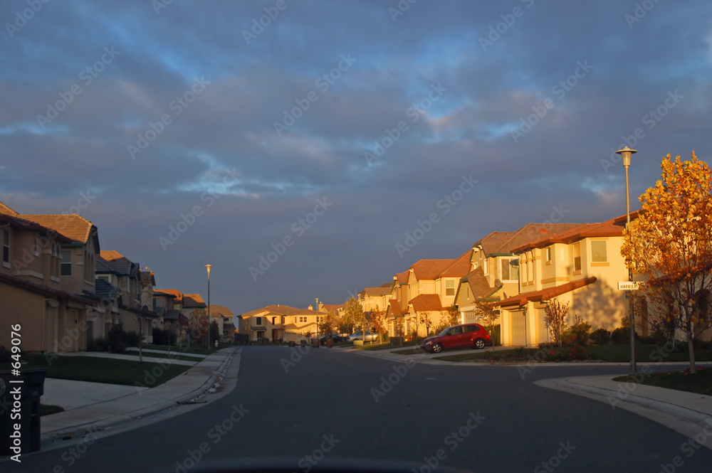 houses lit by evening sun