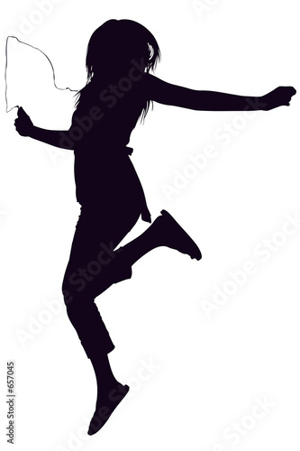 silhouette with clipping path of teen jumping photo