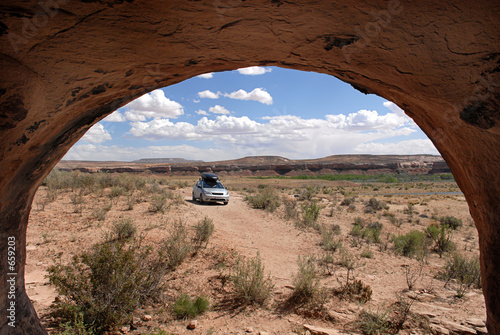 cave view of car and desert