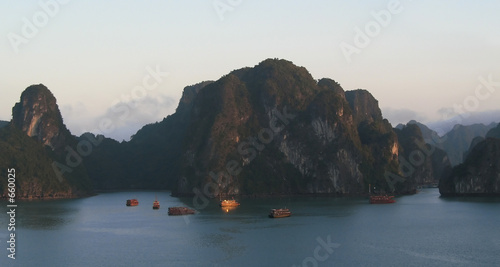tourist junks sailing on halong bay, vietnam