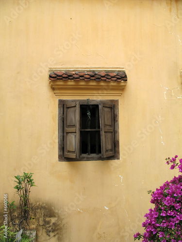 rustic wall with window, hanoi, vietnam