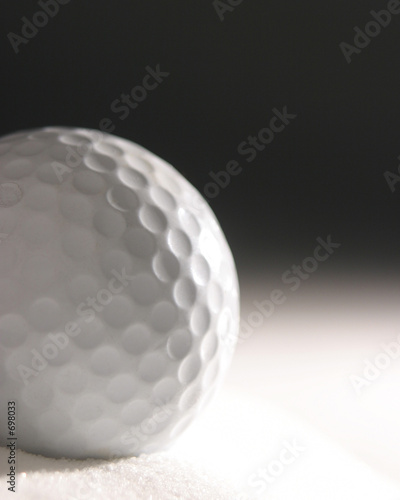golf ball in sand dune