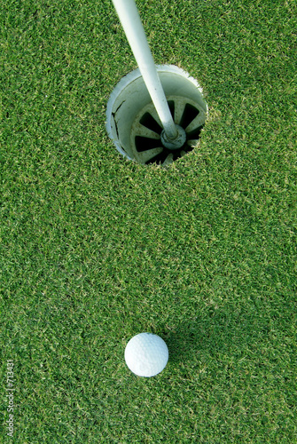 golf ball near hole