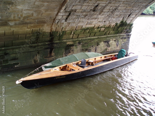 boats moored under richmond bridge
