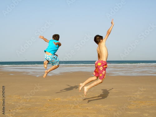 boys jumping photo