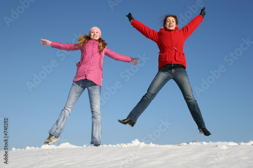 girls jumping. winter.