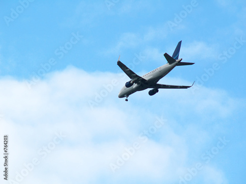 airplane in the sky preparing to land