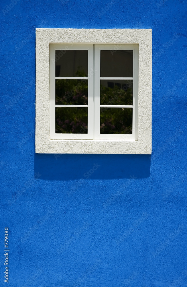 white window on bright blue