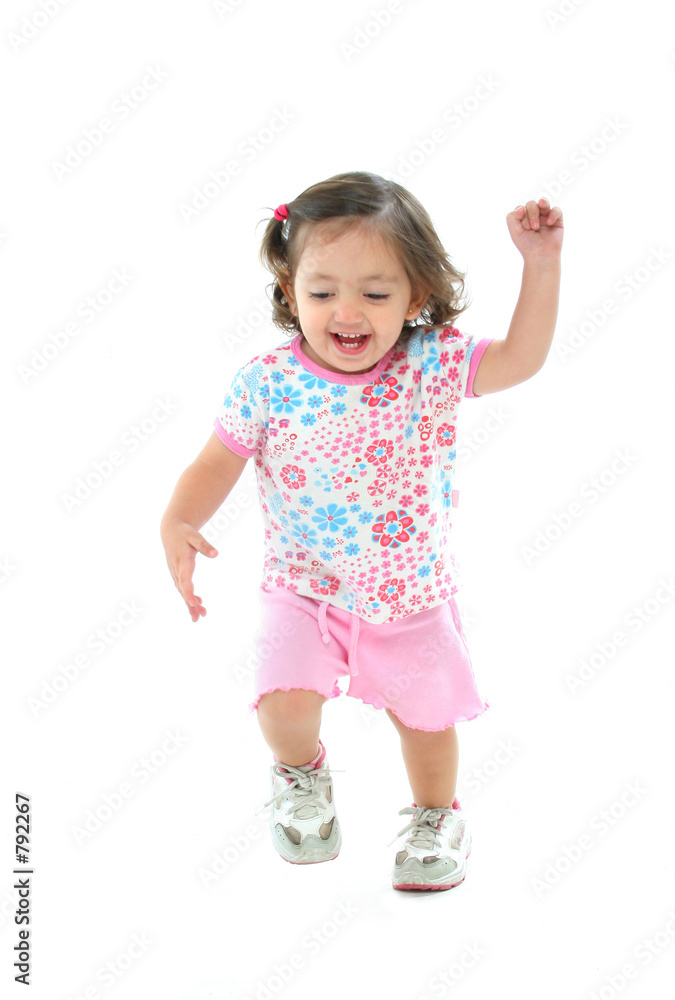little girl smiling and dancing little girl smiling and dancing