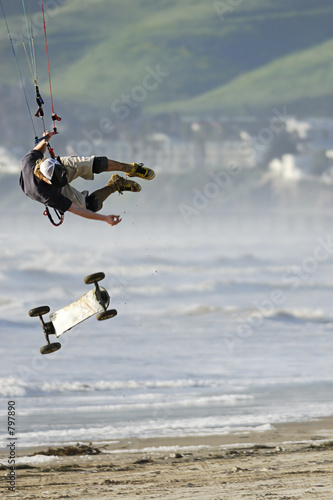 kite skateboarder catching air