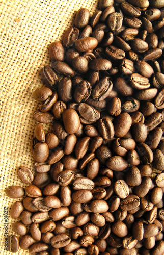 coffee beans on burlap background