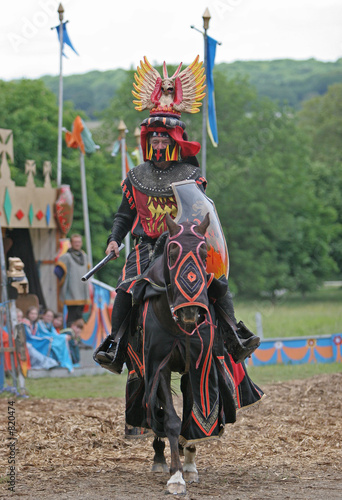 black knight at jousting tournament