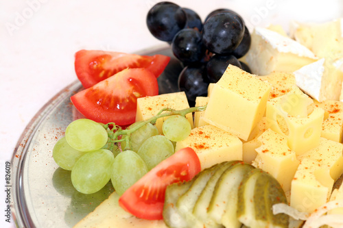 plate of cheese and fruit photo