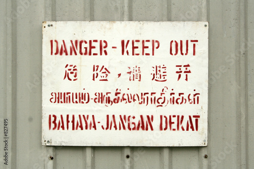 Danger Sign at construction site in 4 languages