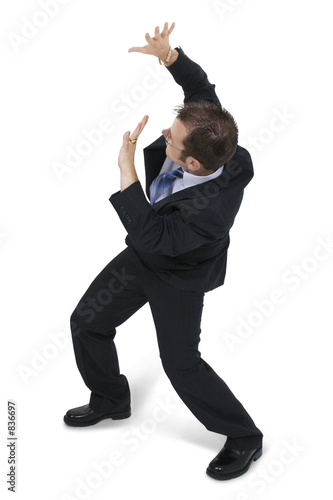 cowering business man