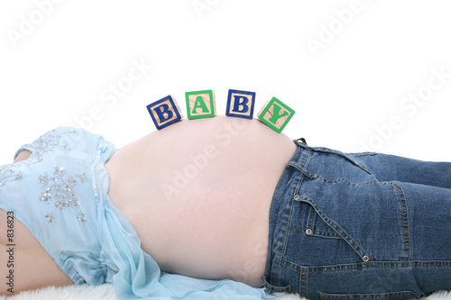 alphabet blocks spell baby across expecting mom be