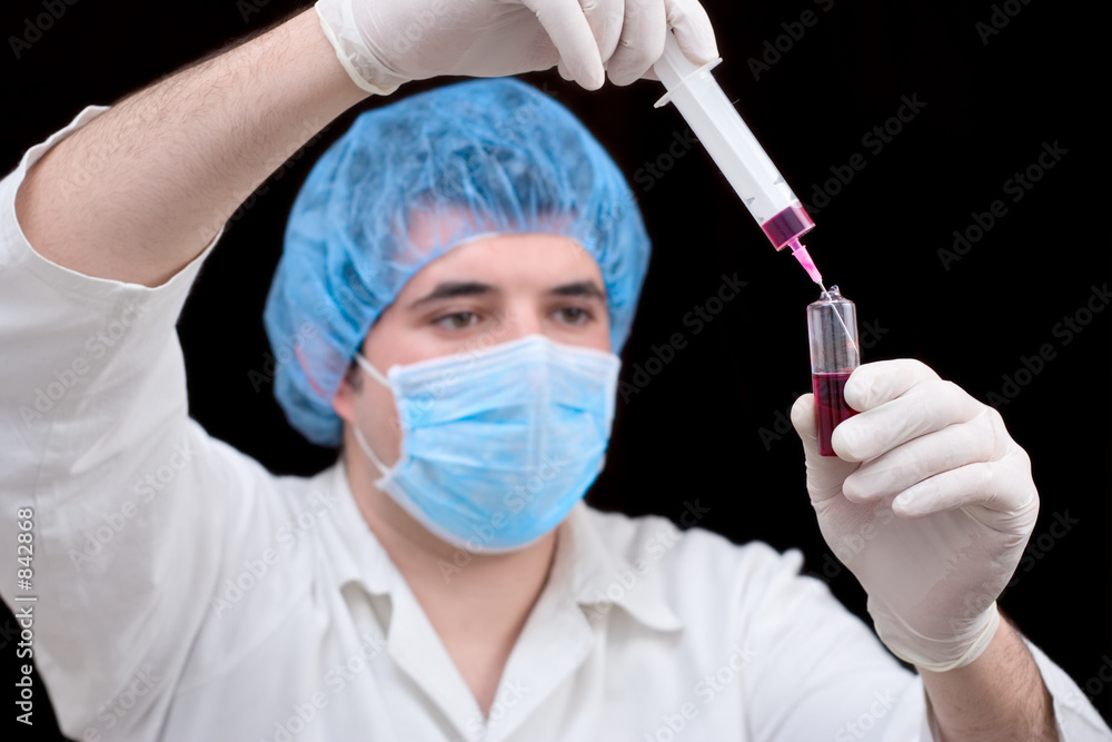 lab technician running blood tests lab technician running blood tests