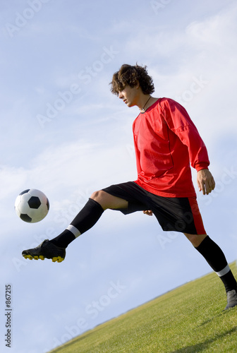 soccer - football player juggling in red